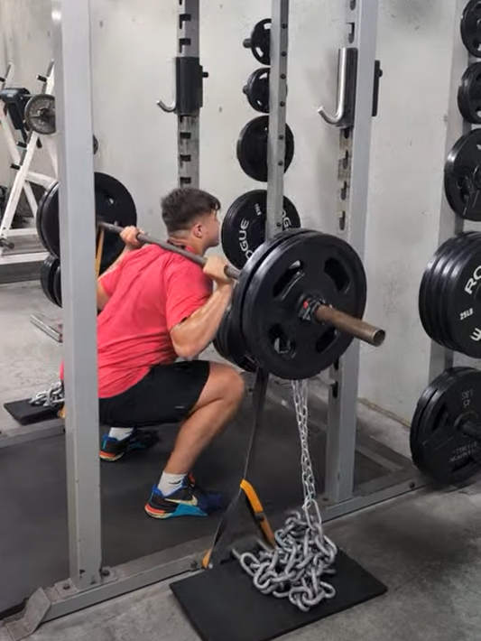 college wrestler training explosive power, squatting with bands and chains
